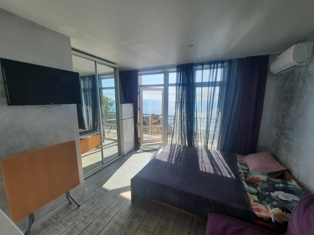 Комната с видом на море 11