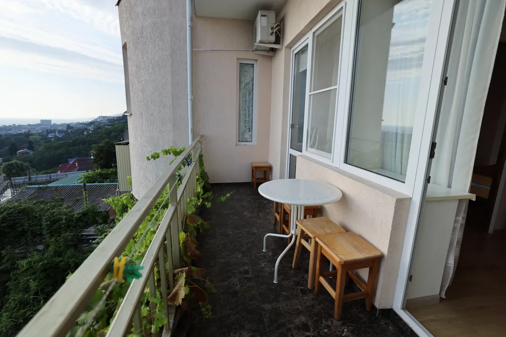 Квартира Квартира Четырехместный номер люкс с доп. местом и балконом с видом на море — Лазаревское