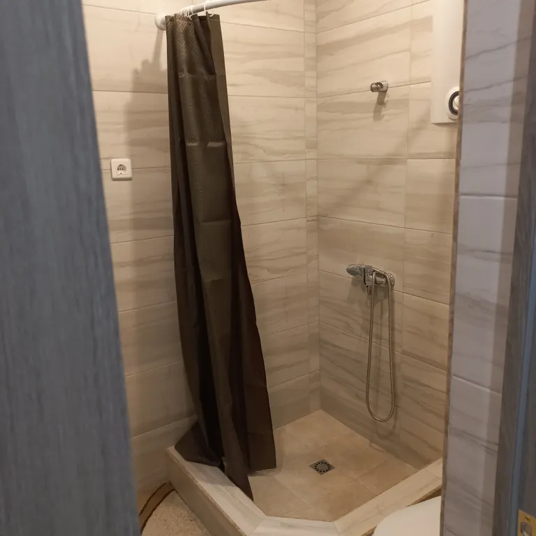 Апартамент с видом на море и горячими источниками