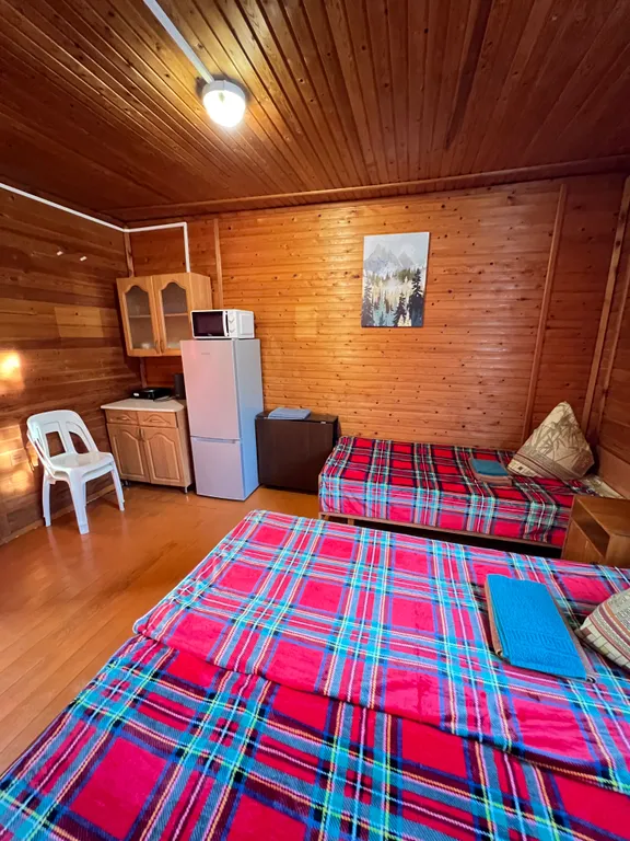 Квартира Жилая комната на четверых в деревянном таунхаусе — Апшеронск