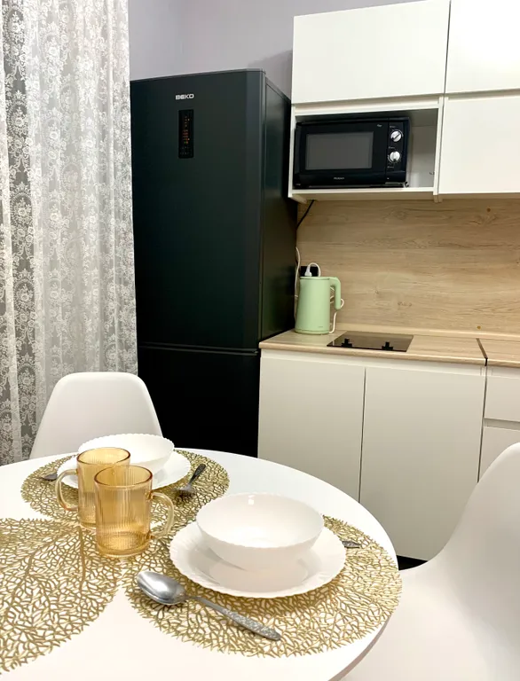 Современная квартира в новом жилом комплексе рядом с въездом в город