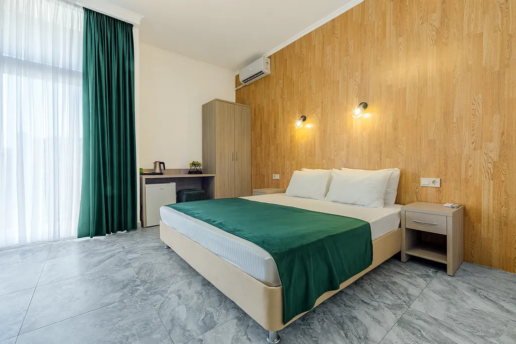 Квартира Улучшенный  стандарт с балконом — аренда посуточно в Гагра