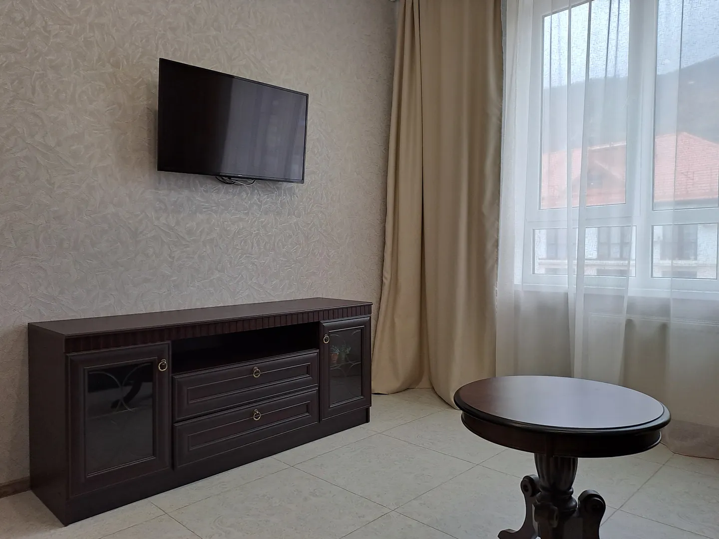 Телевизор в гостинной Телевизор в гостинной