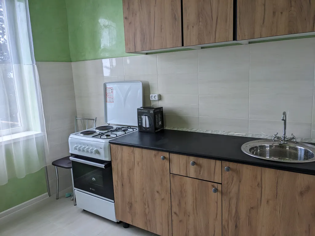 Уютная квартира в городе с видом на горы