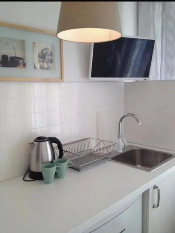 Комната с двуспальной кроватью и общим санузлом