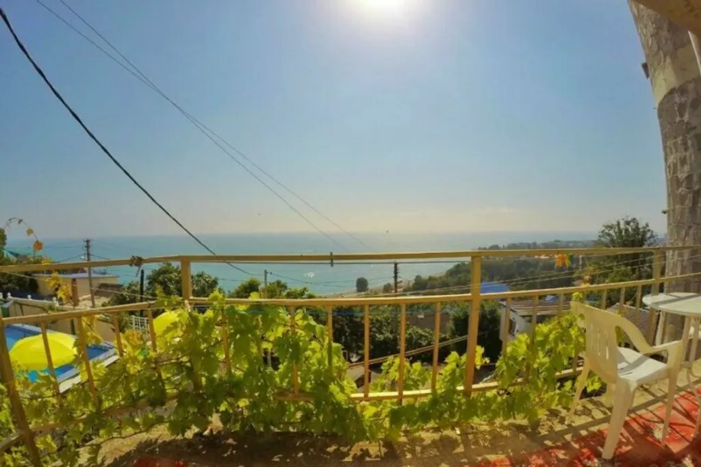 Квартира Квартира Четырехместный номер люкс с доп. местом и балконом с видом на море — Лазаревское