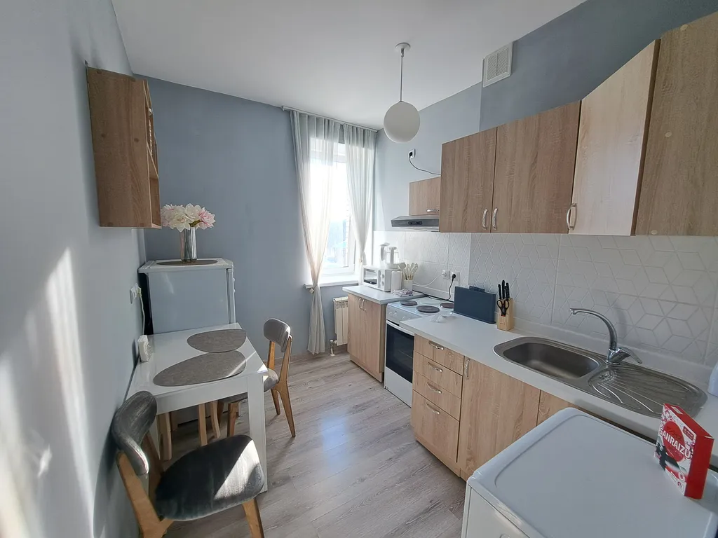 Светлая однушка с кроватью и смарт ТВ