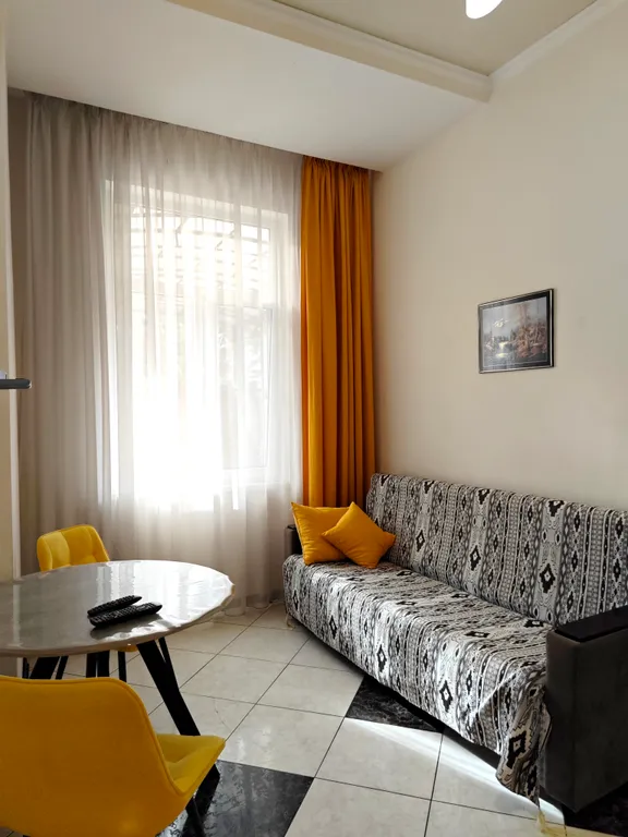 Апартаменты на колоннаде с лаундж зоной для отдыха