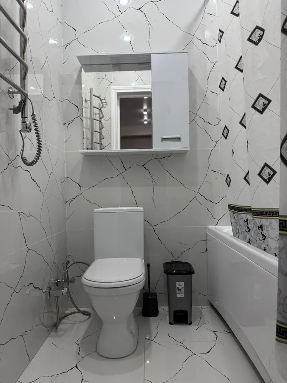 Уютная квартира в центре города рядом с фонтаном, с видом на город