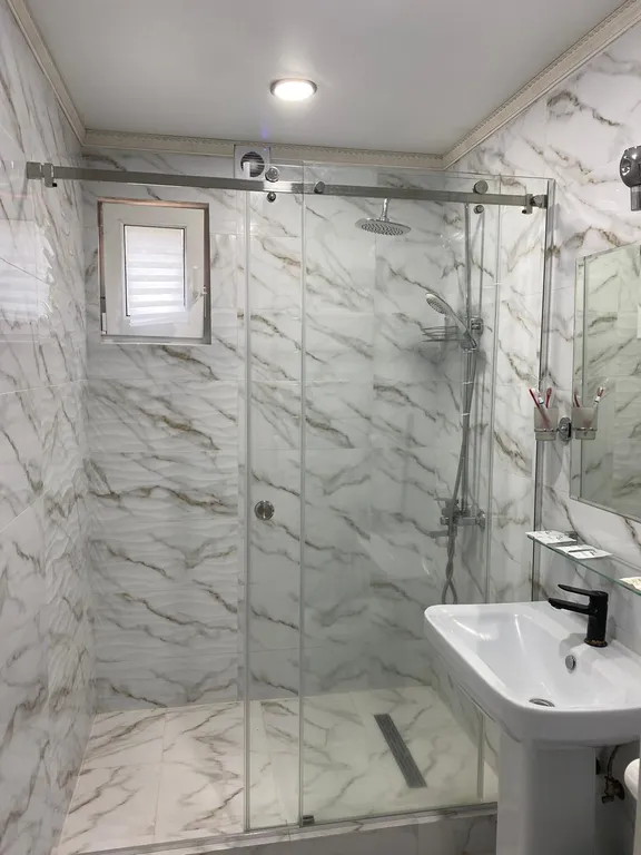 Malkar house с видом на гору Чегет