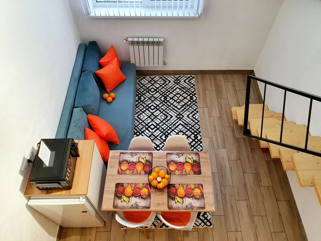 Комфортный двухуровневый апартамент в элитном комплексе Колизей