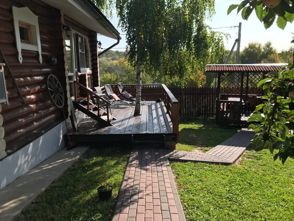 Дом из бревна Терем с сауной в черте города