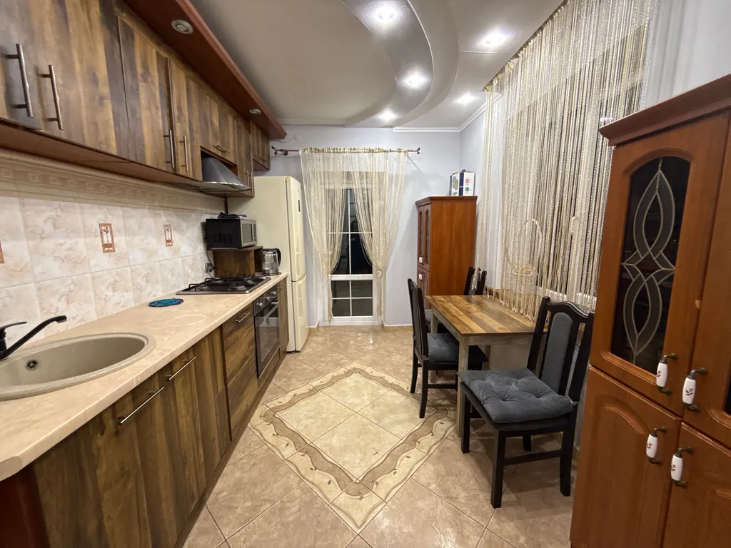 Уютный коттедж в черте города