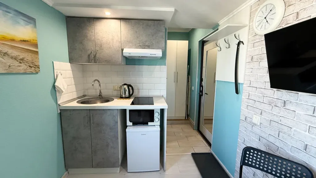 Стильная двухуровневая студия