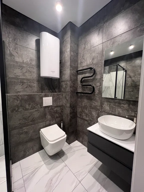 Уютная квартира в тихом районе с большой парковкой