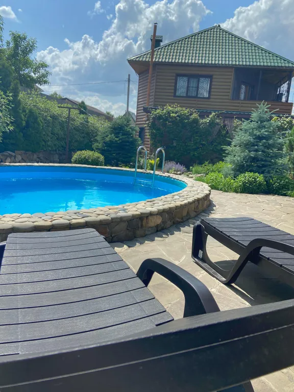 Загородный дом с баней и теплым бассейном