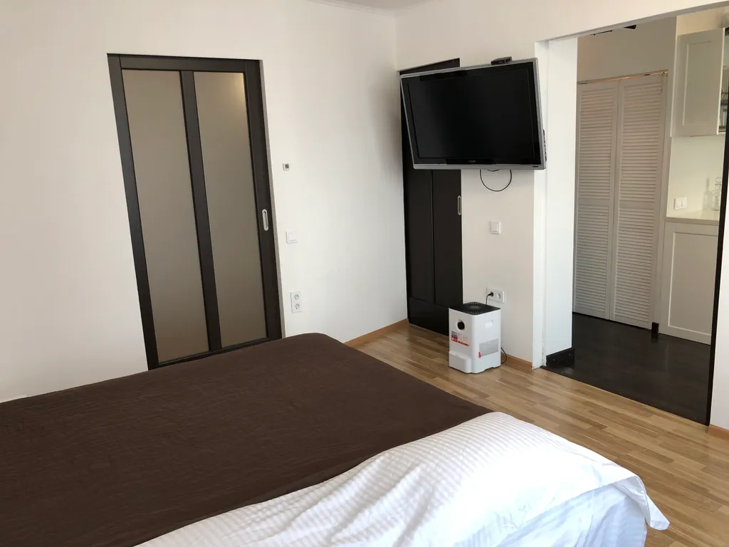 Квартира Современная квартира на берегу Волги с песчаным пляжем у подножия дома — Нижний Новгород