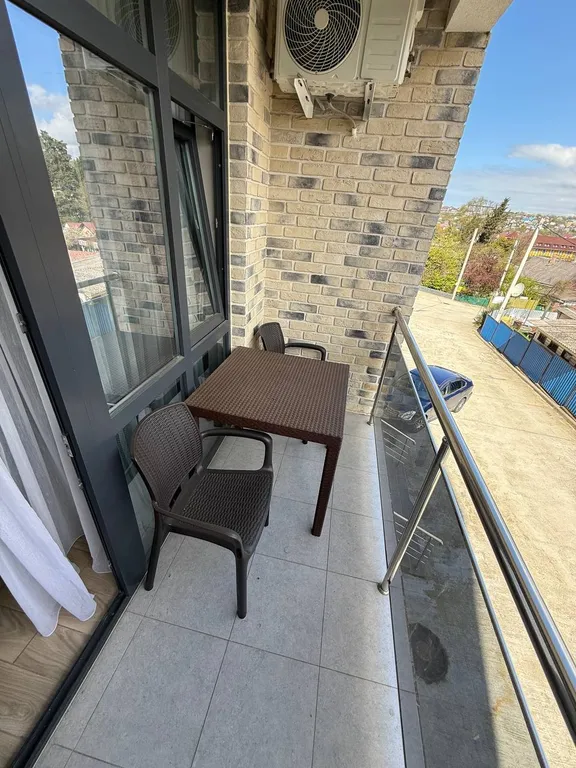 Апартаменты с двумя бассейнами на берегу моря