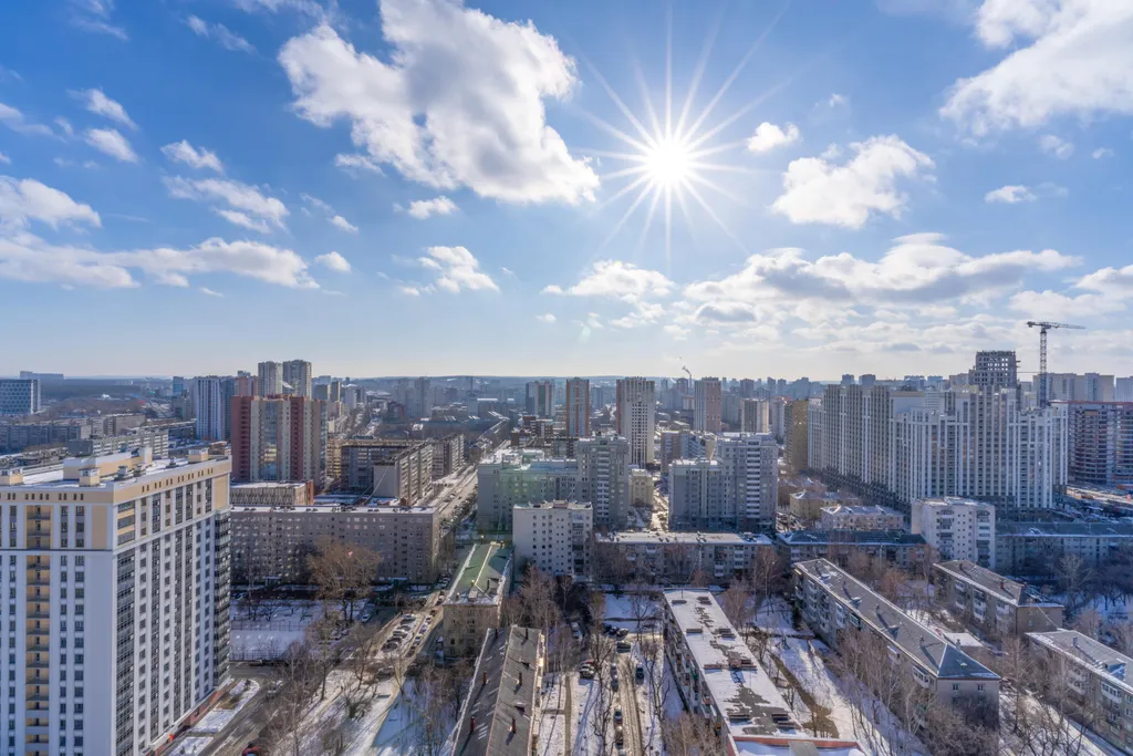 Апартамент с угловой солнечной спальней и видом на город