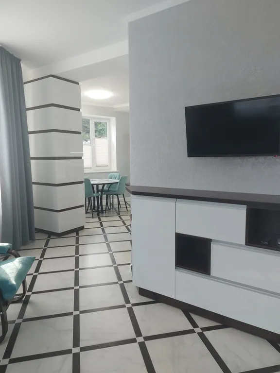 Современные апартаменты в гостевом доме с видом на море