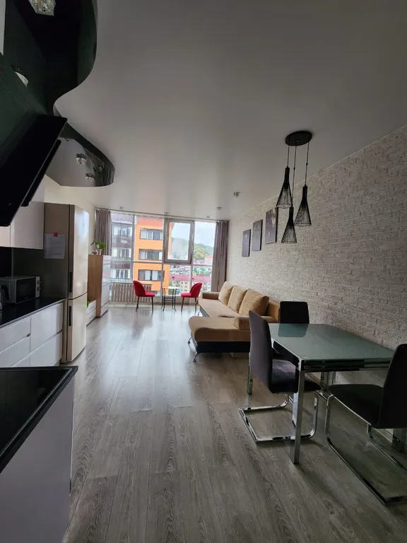 Апартаменты с видом в горы и в город