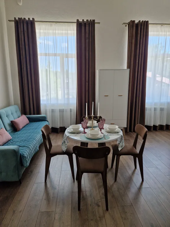 Уютная двухуровневая студия в центре