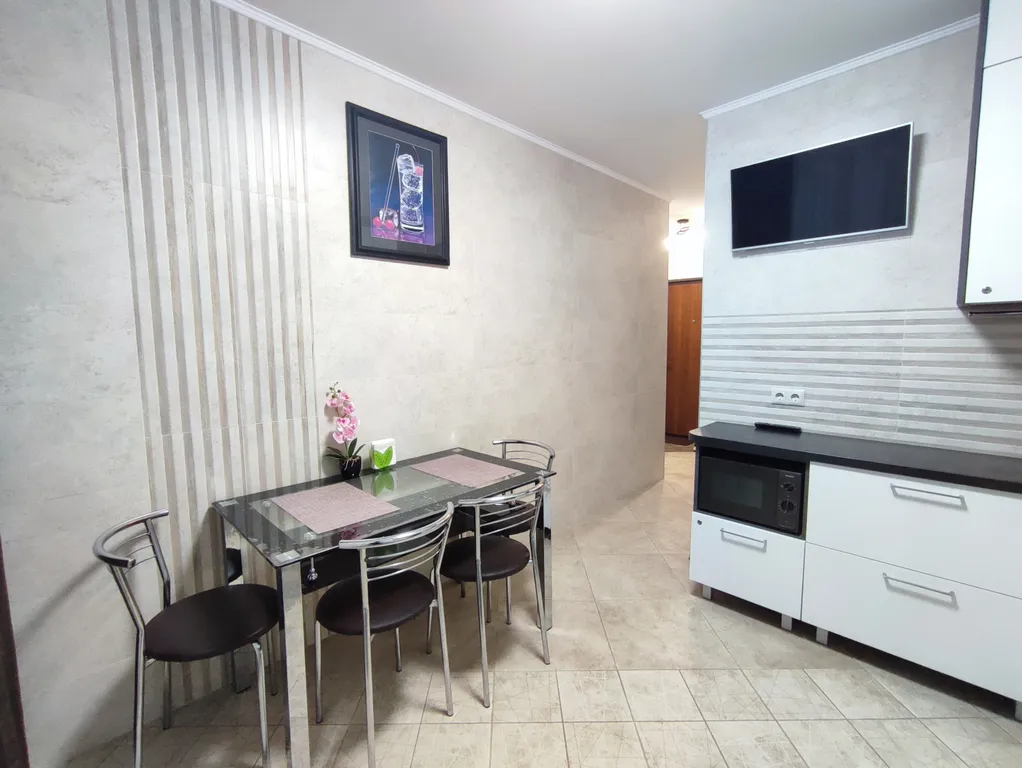 Новые апартаменты в центре, Амфитеатр, парки и старый город рядом.