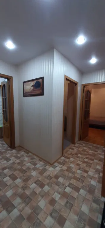 Двушка с видом на ёлочки.