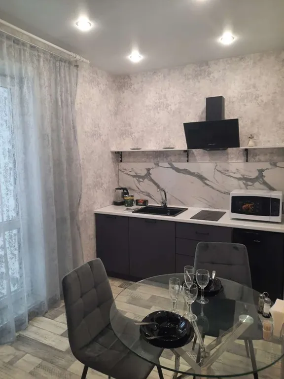 Уютная студия с видом на город