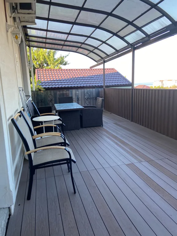 Апартаменты с личной террасой и кухней для семьи из 4 человек