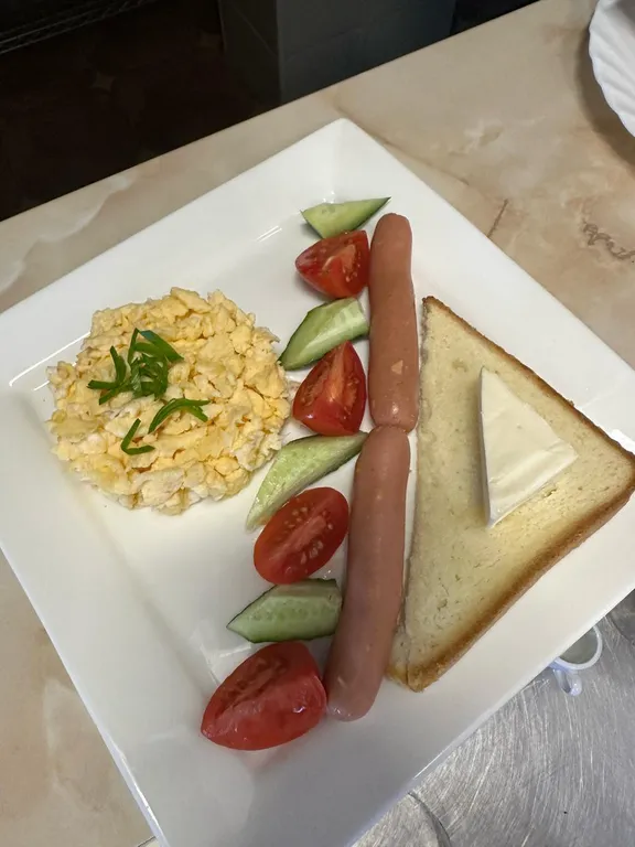 Уютный двухместный номер с двуспальной кроватью и видом на море