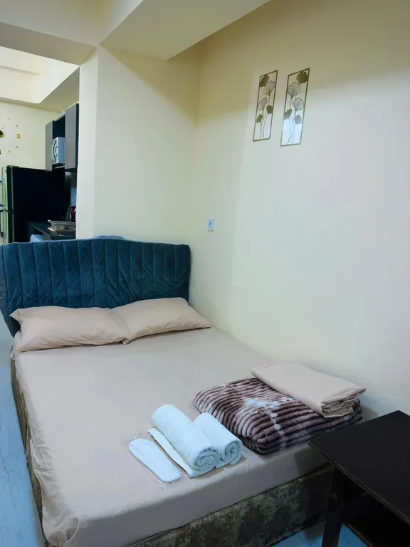 В центре рядом с музеем Сергея Параджанова