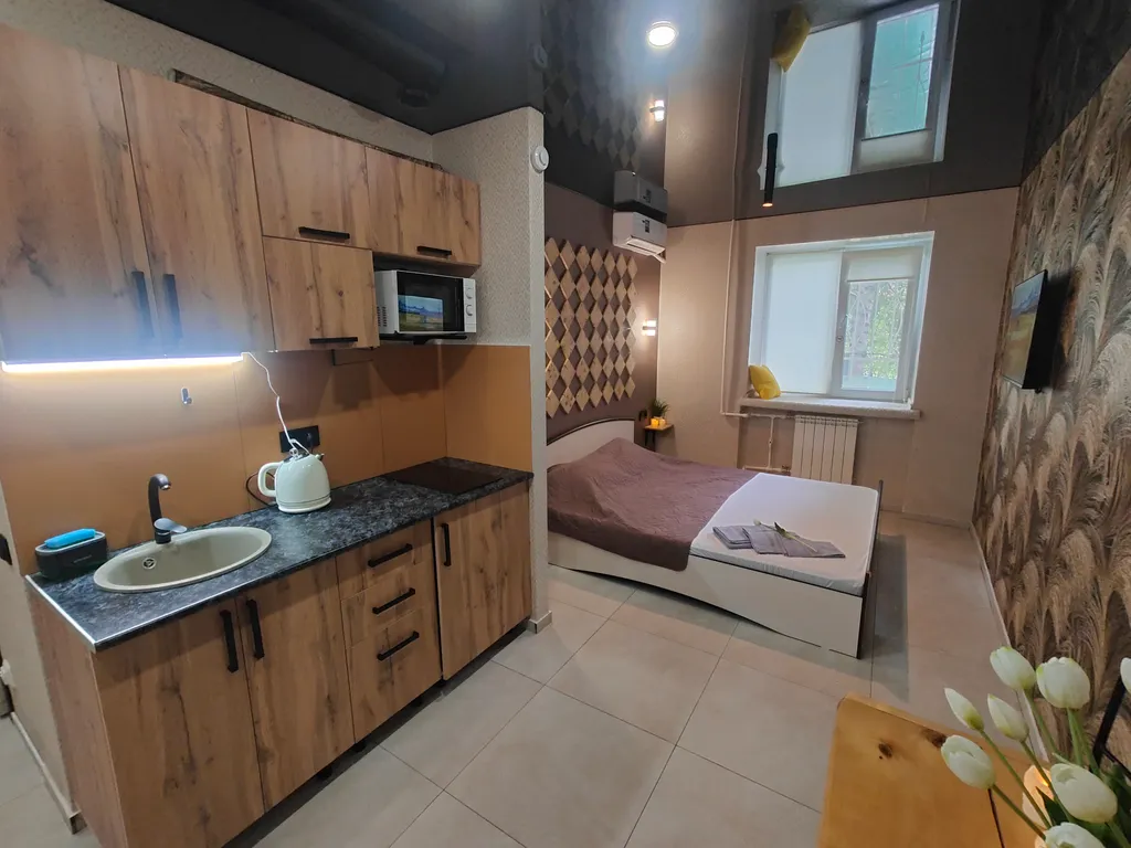 Квартира Уютная студия напротив университета и парка в центре Нефтяников — Омск