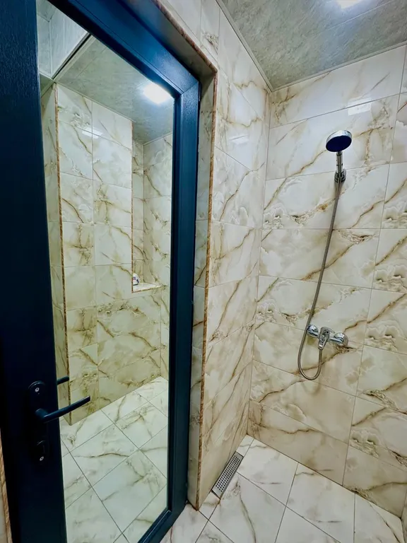 В центре рядом с музеем Сергея Параджанова