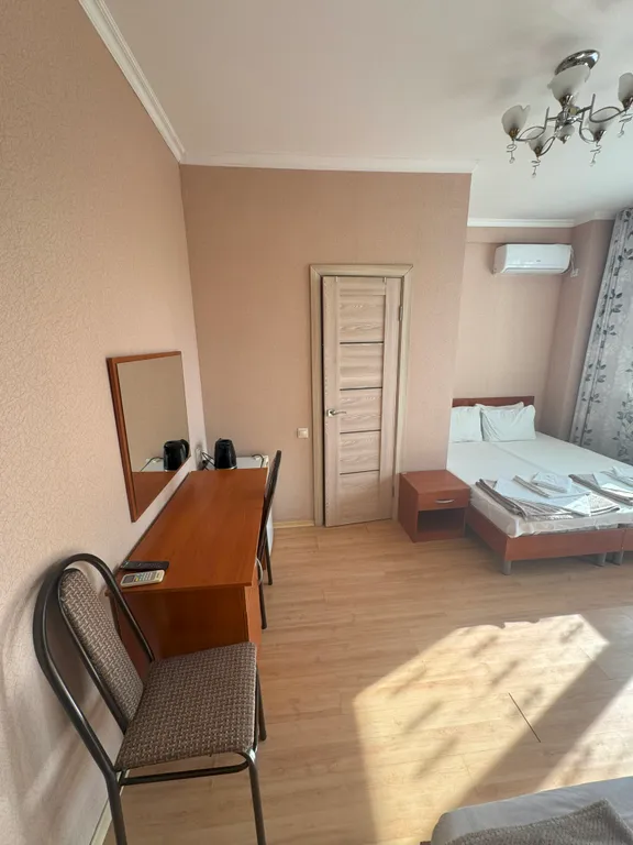 Трёхместный номер с балконом