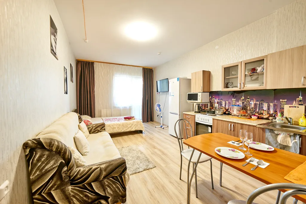 Современная студия с балконом на 21 этаже  в самом центре города