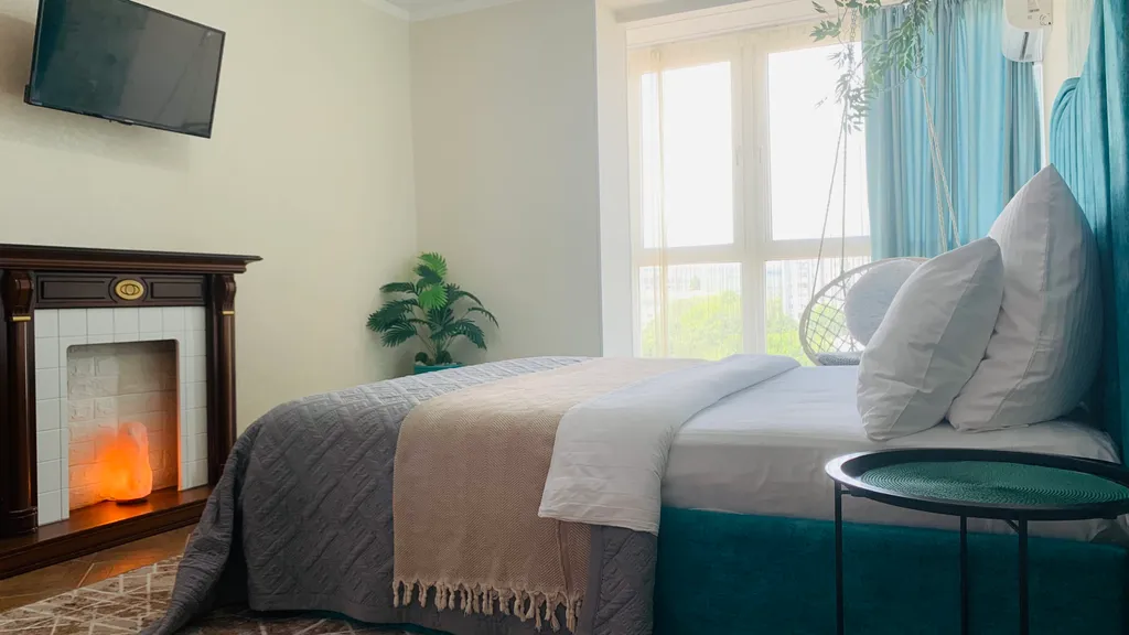 Квартира с гамаком и камином