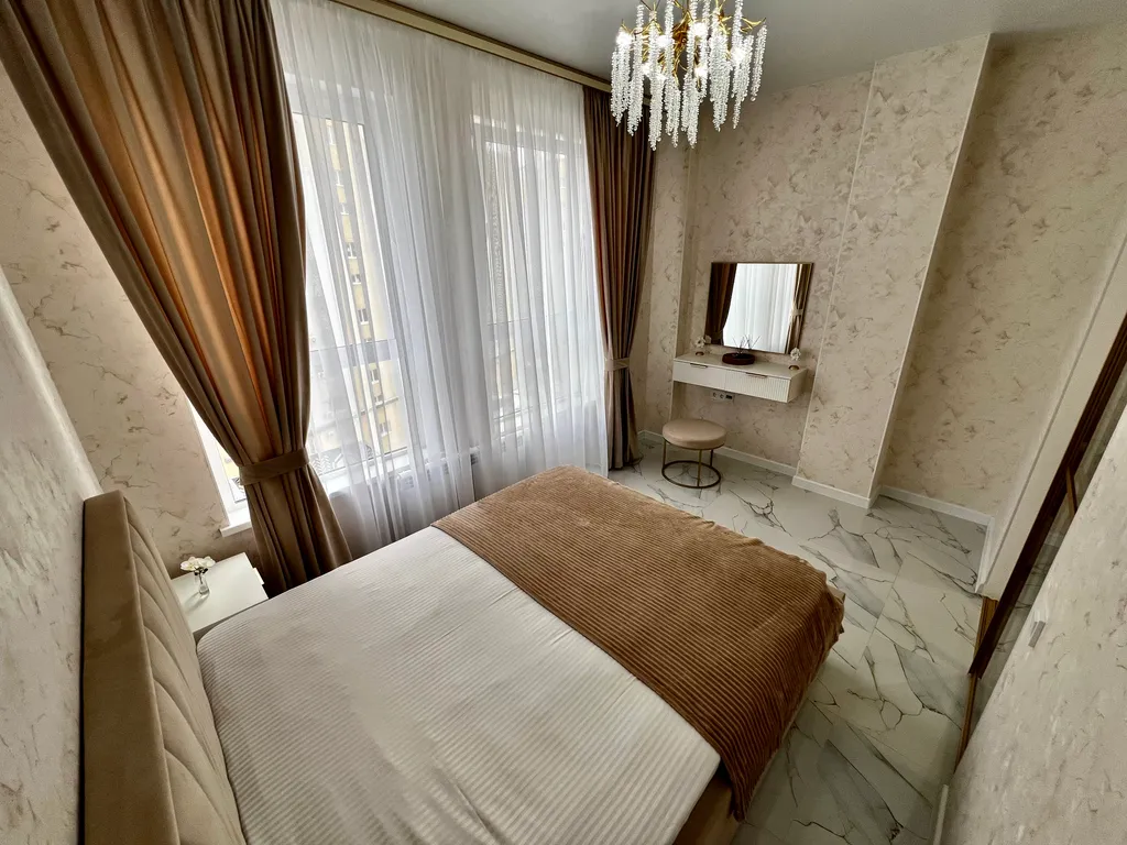 Уютная квартира в элитном доме с дизайнерским ремонтом