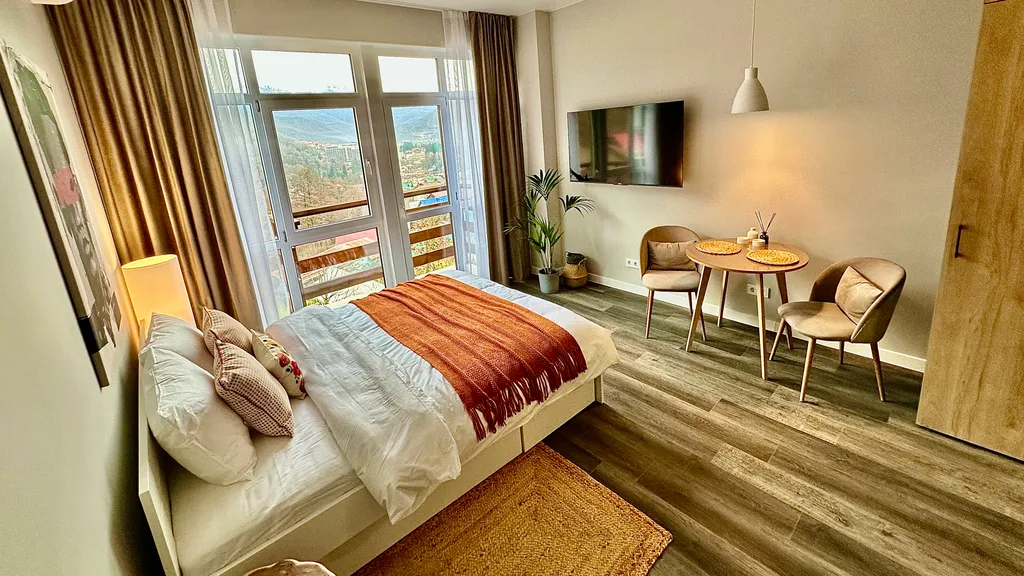 #58 Стильные апартаменты с видом на горы