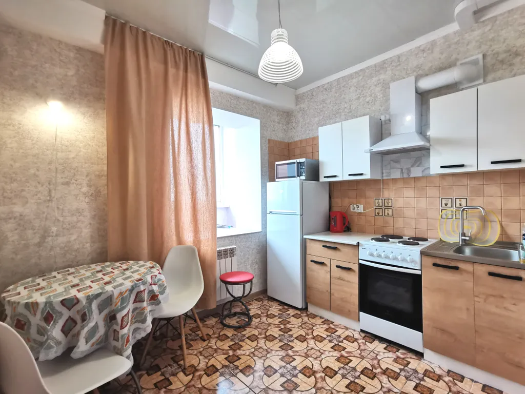 Солнечная квартира с видом на город