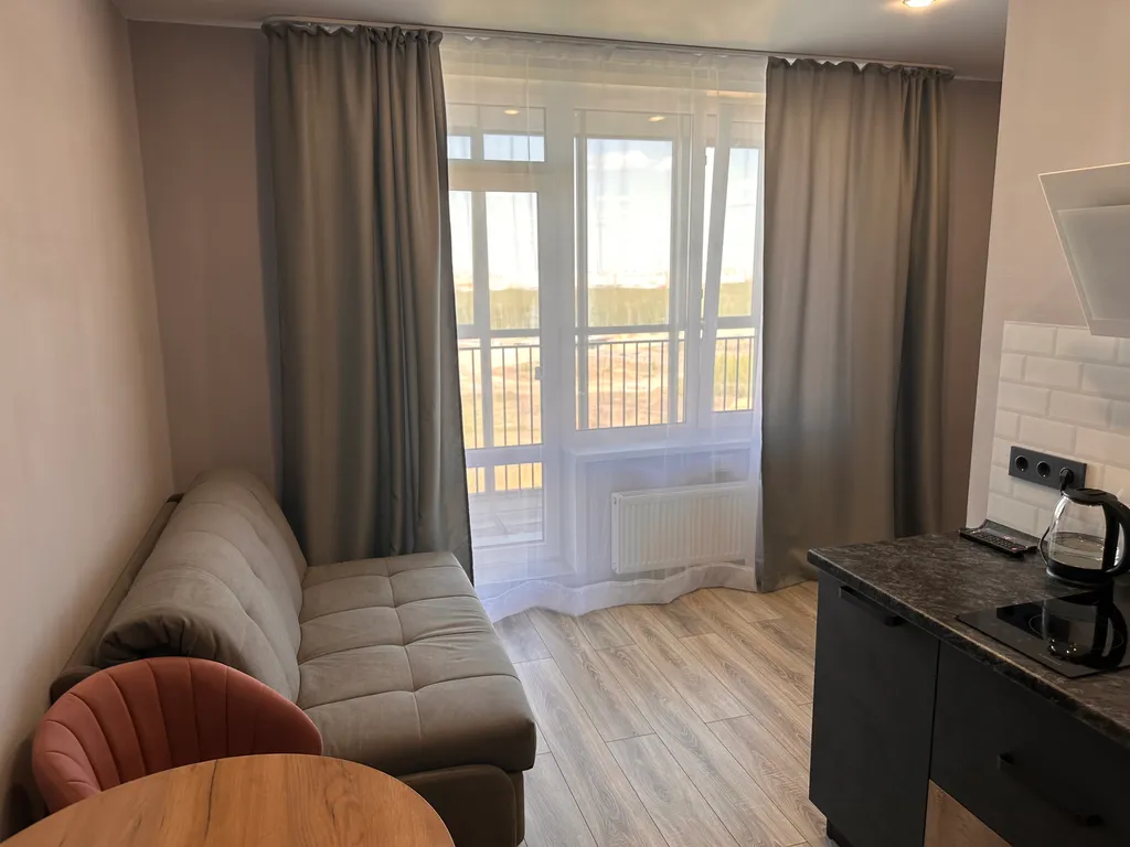 Уютная студия с видом на город