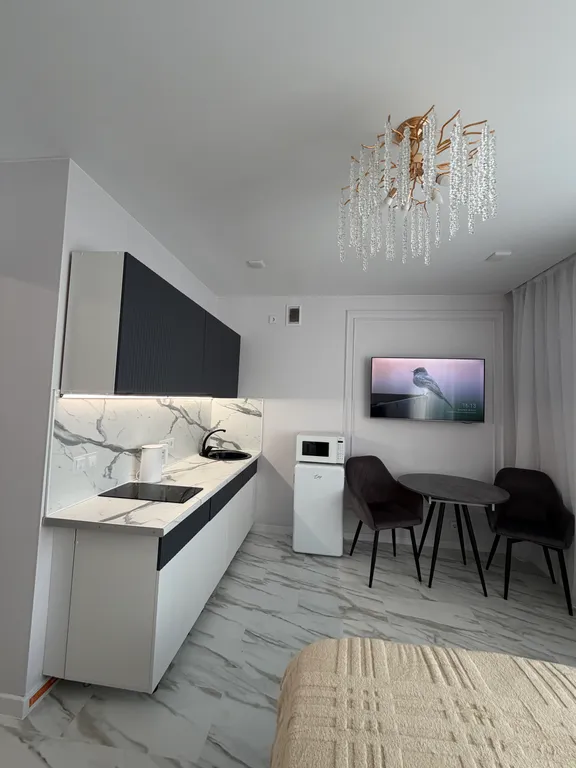 Уютная квартира-студия с шикарным, панорамным видом на город и Китай