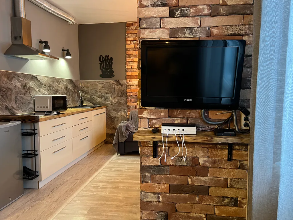 Уютный лофт с часами на Северном