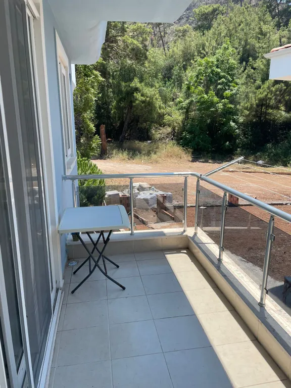 Апартамент с бассейном во дворе в райском уголке Ичмелера