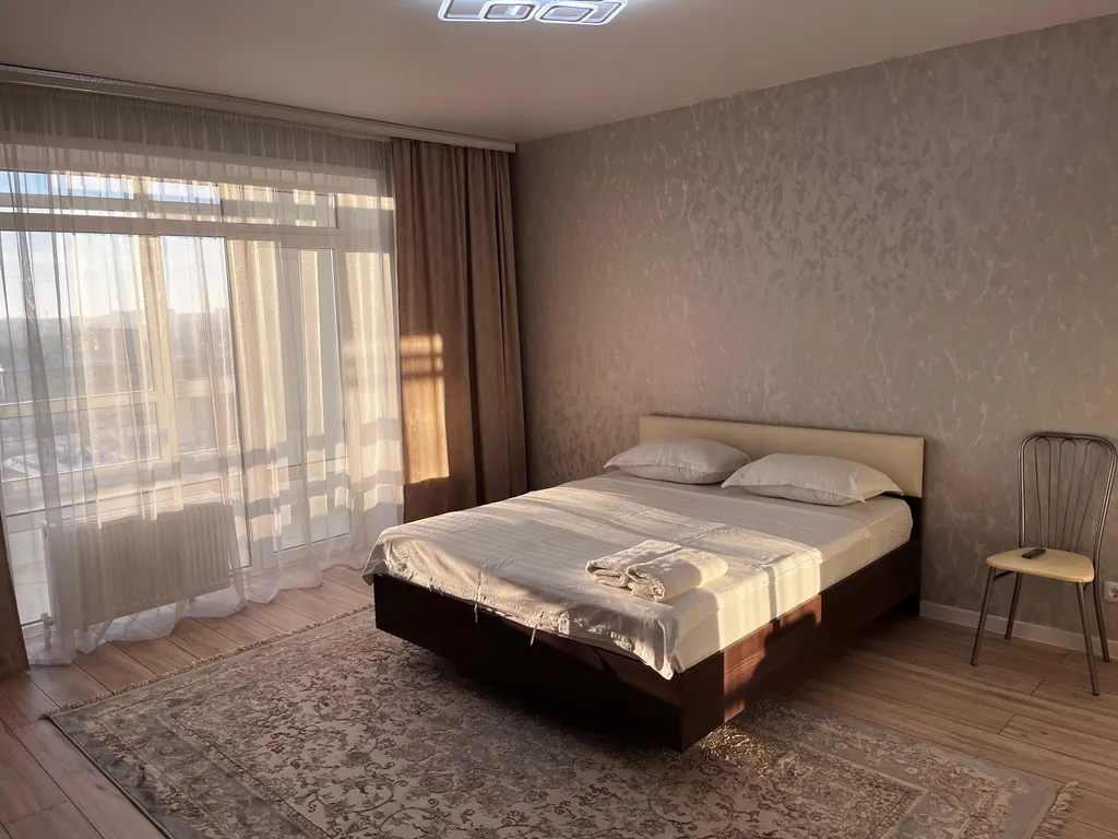 Новая квартира в новом ЖК Панорама с панорамным видом из окна на город