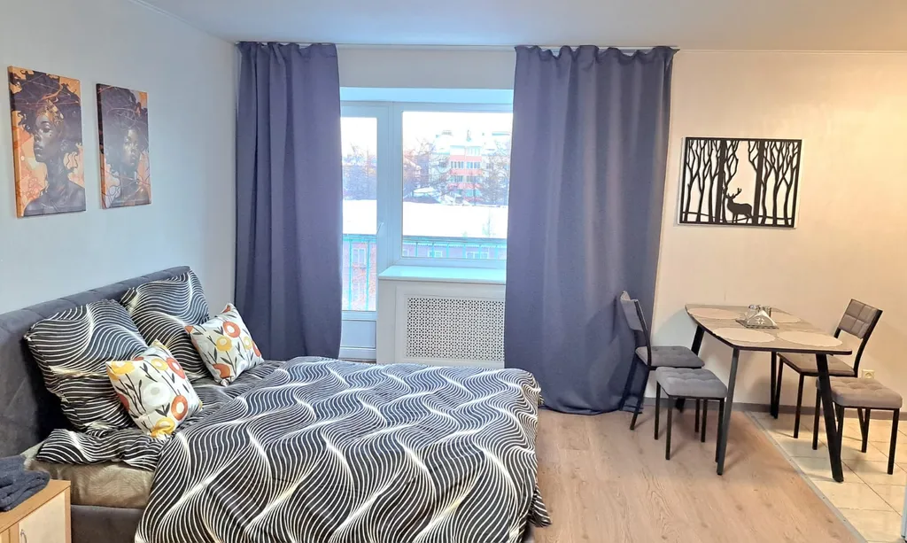 Уютная студия в центре с балконом