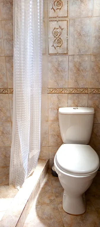 Коттедж Коттедж-студия с двориком в 5-6 минутах к пляжу и набережной — Ялта