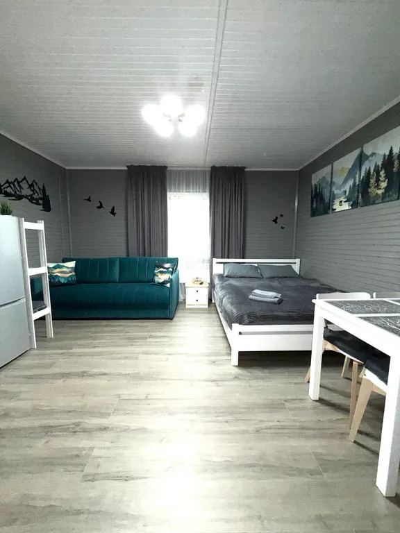 Квартира Уютная комната для четверых в деревянном таунхаусе у озера — Мезмай