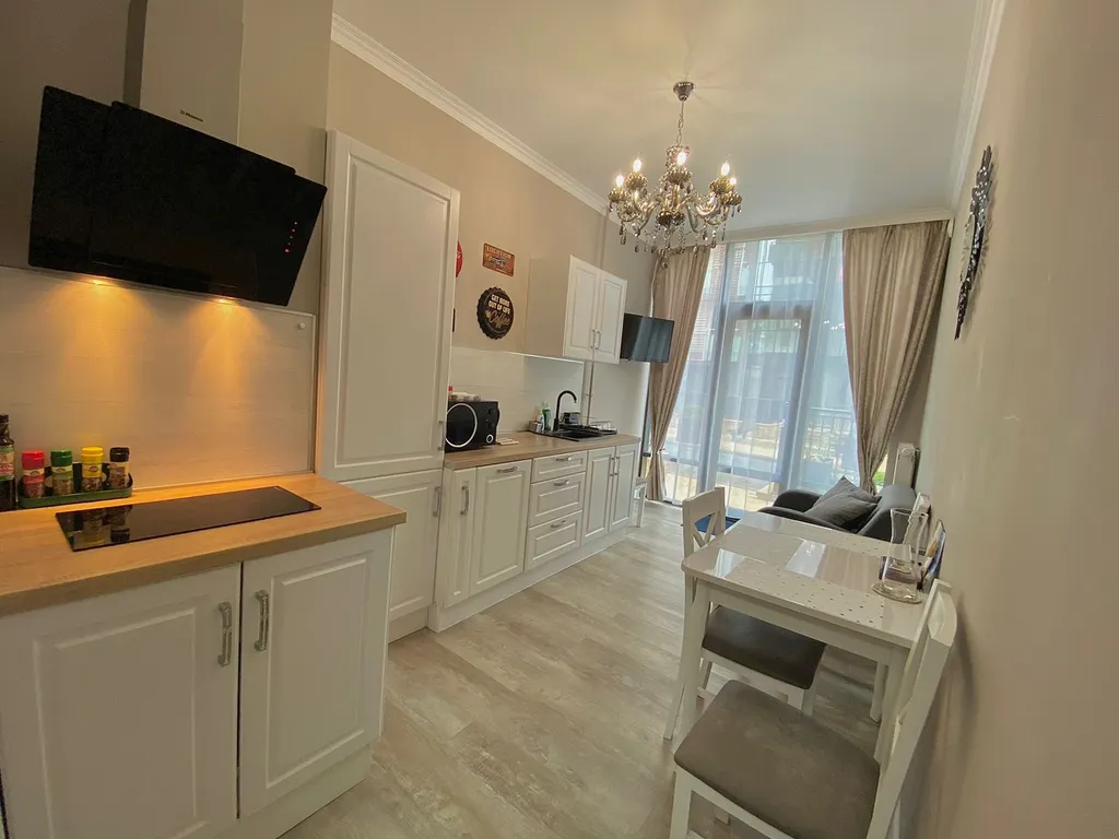 Светлые апарты с собственной террасой у самого моря