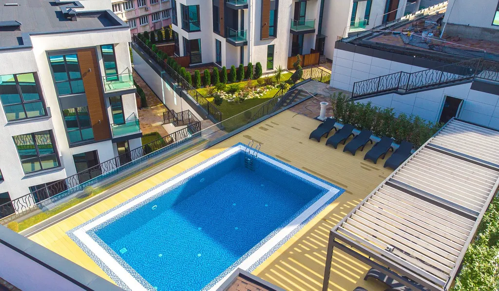 Квартира Квартира Современная студия в жилом комплексе с бассейном — Сочи